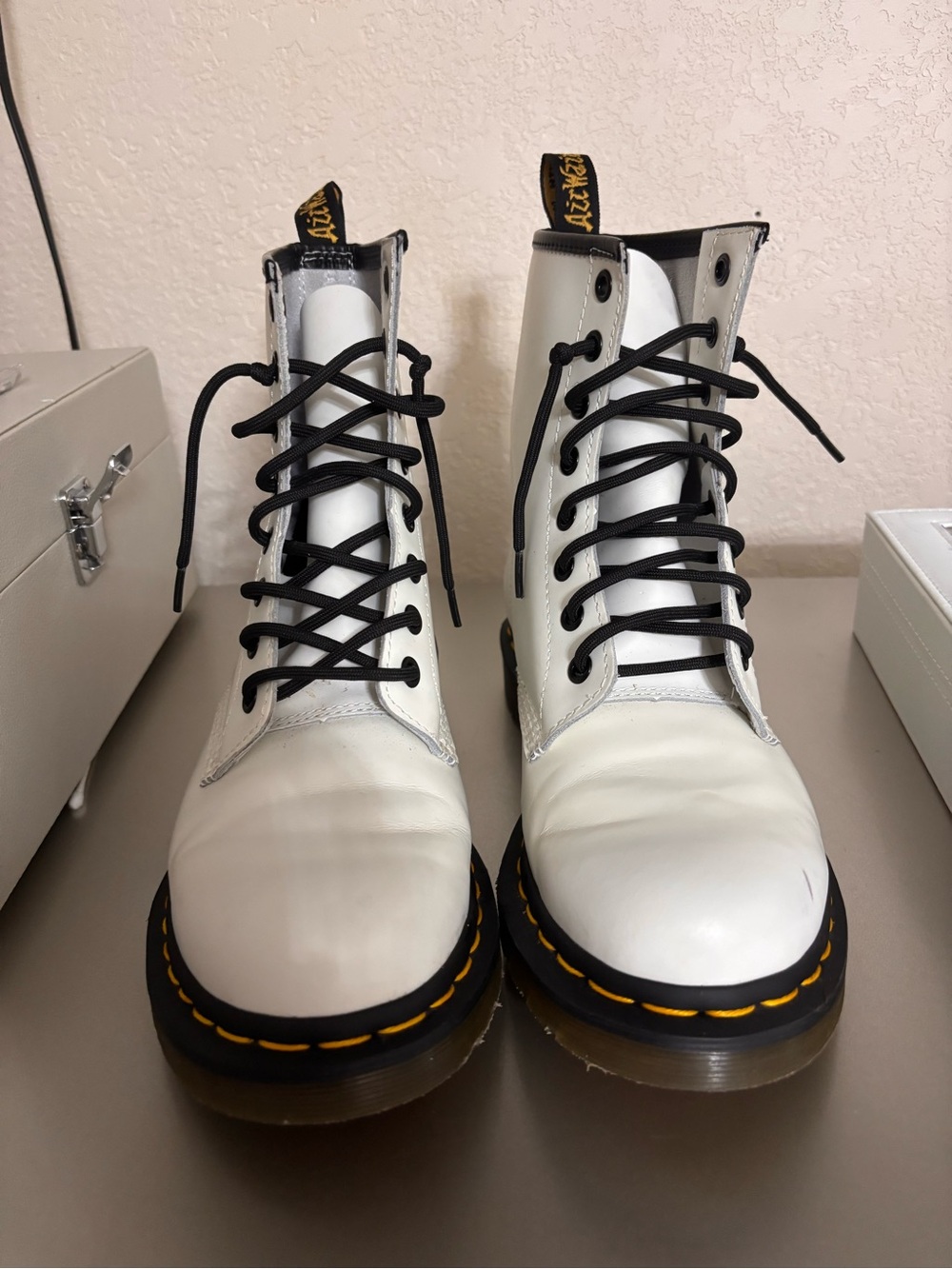 Dr. Martens White Leather Lace-Up Boots with Black Trim and Yellow Heel Loop